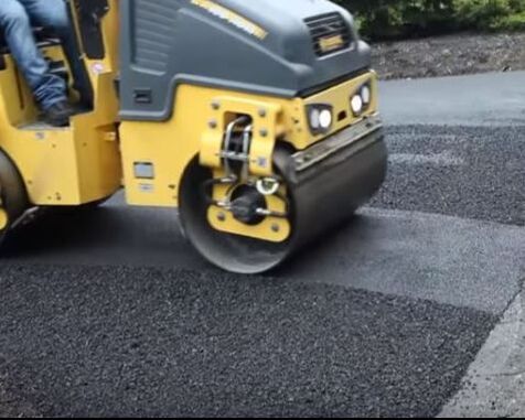 Compacting Asphalt in a Parking Lot Jersey Strong Paving NJ